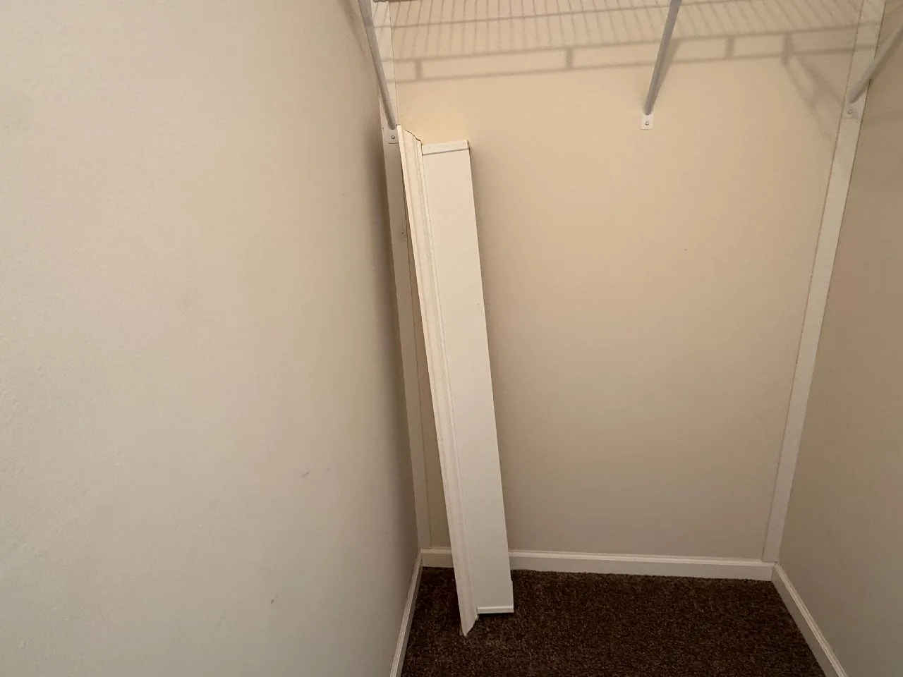 Upstairs interior bedroom in a Roseville MN home — wall surface and door-fit review